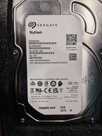 Seagate SkyHawk 6TB Surveillance Harms – 24/7 Recording, 256mb, for 64 Camera Support, Data Recovery Service Included (ST6000VXZ09)